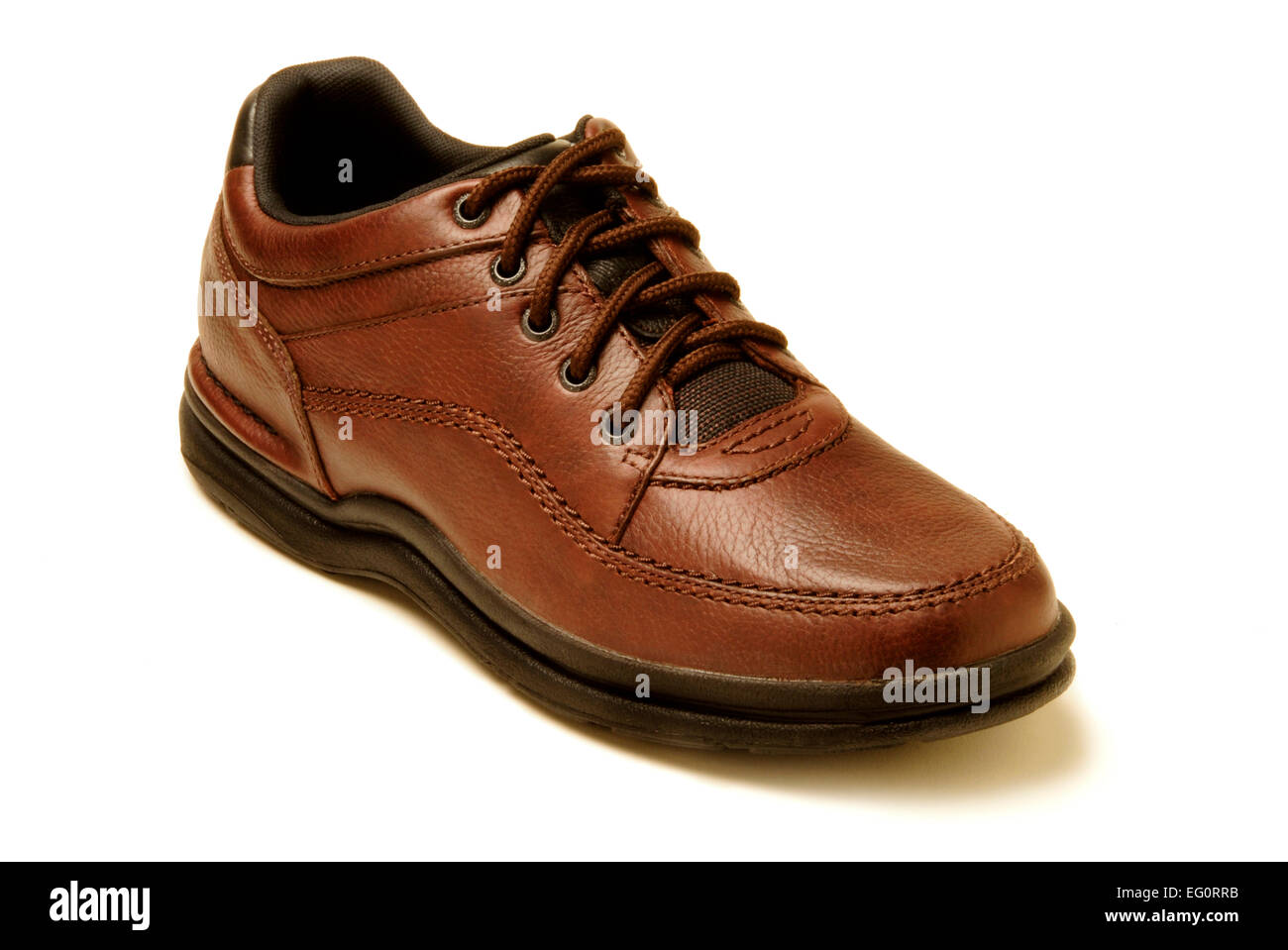 Single brown shoe isolated against white Stock Photo