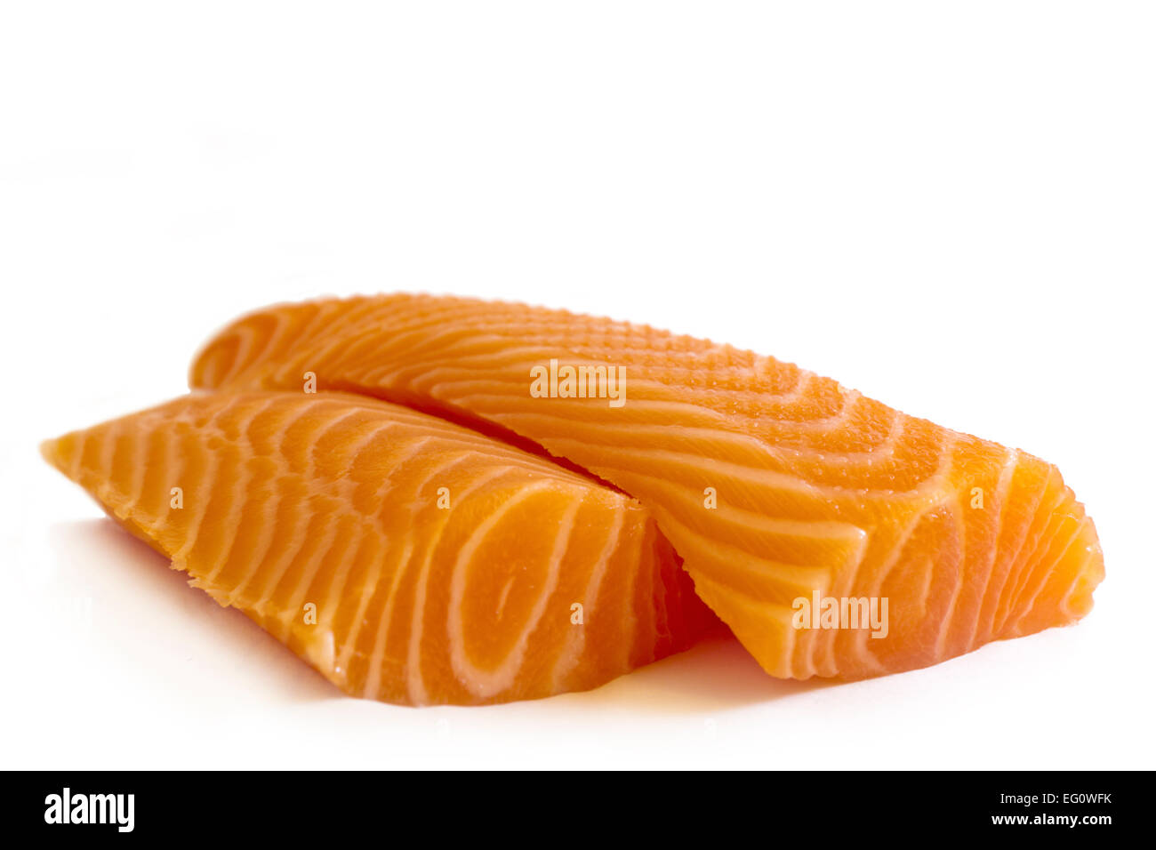 Two slices of wild salmon fish on white background. Salmon is the