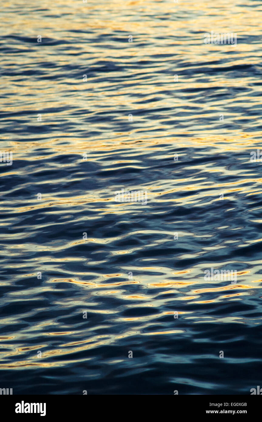 wave textures during sunset. Stock Photo