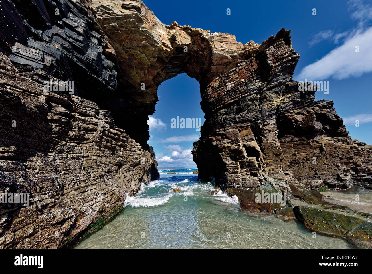 Spain, Galicia: Impressing rock arcade at Cathedral´s beach Stock Photo