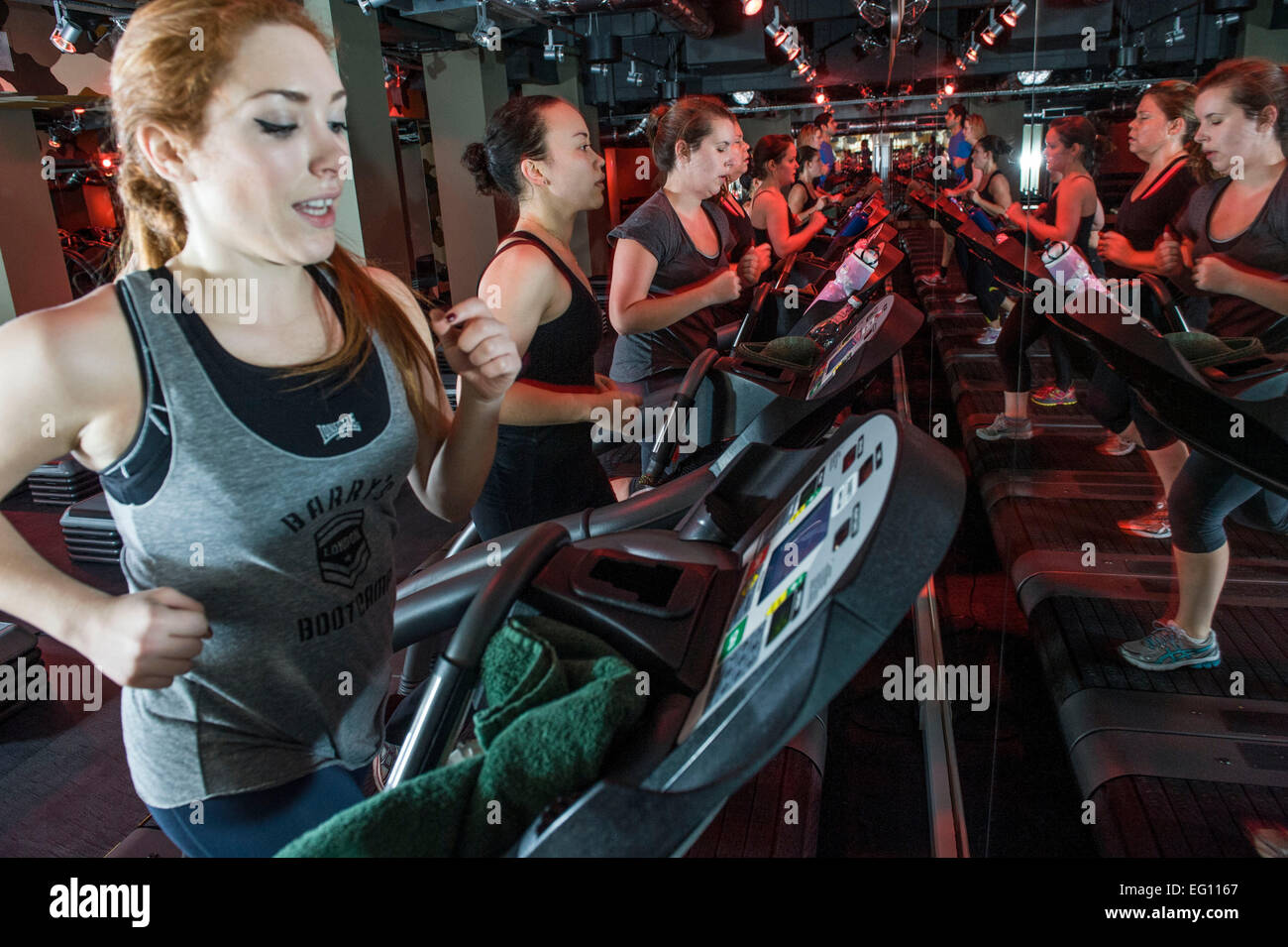running machine Barry's Bootcamp fitness London Euston Stock Photo