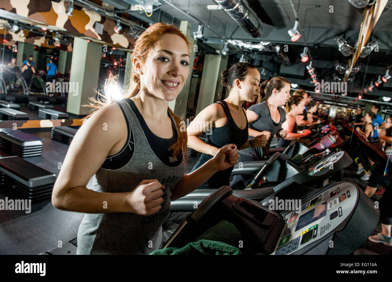 running machine Barry's Bootcamp fitness London Euston Stock Photo