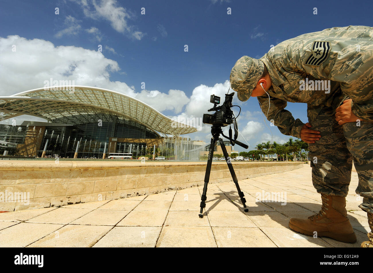 U.S. Air Force Technical Sergeant Juan Valdez a videographer with 4th Combat Squadron March ARB, CA. videotapes the outside of the new Centro de Convenciones de Puerto Rico, San Juan, Puerto Rico, during the 2009 League of United Latin American Citizens LULAC Convention and Exposition, July 14, 2009. LULAC is the nation's oldest and largest Hispanic organization that has been advocating for Latinos in the United States for 80 years.  by TSgt Efren Lopez Stock Photo