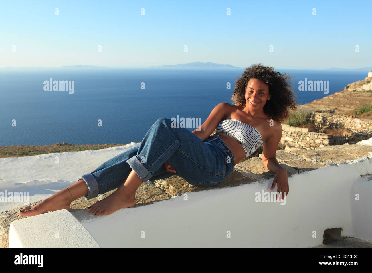 greece a young mixed race girl posing on holiday Stock Photo