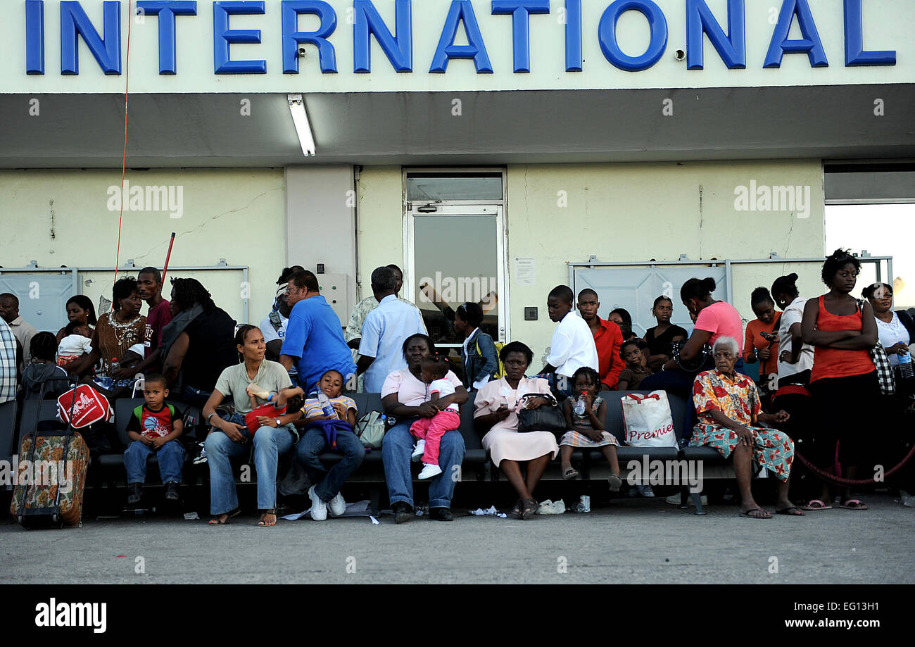 U.S. citizens wait to be evacuated from Toussaint Louveture International Airport, Port Au Prince, Hati on January 17, 2010. Hati was struck by an earthquake that leveled much the countries infrastructure. Master Sgt. Jeremy Lock Stock Photo
