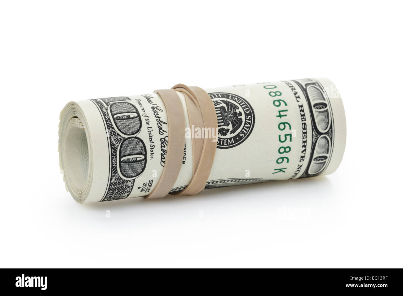 rolled hundred dollar banknotes tied with rubberband Stock Photo