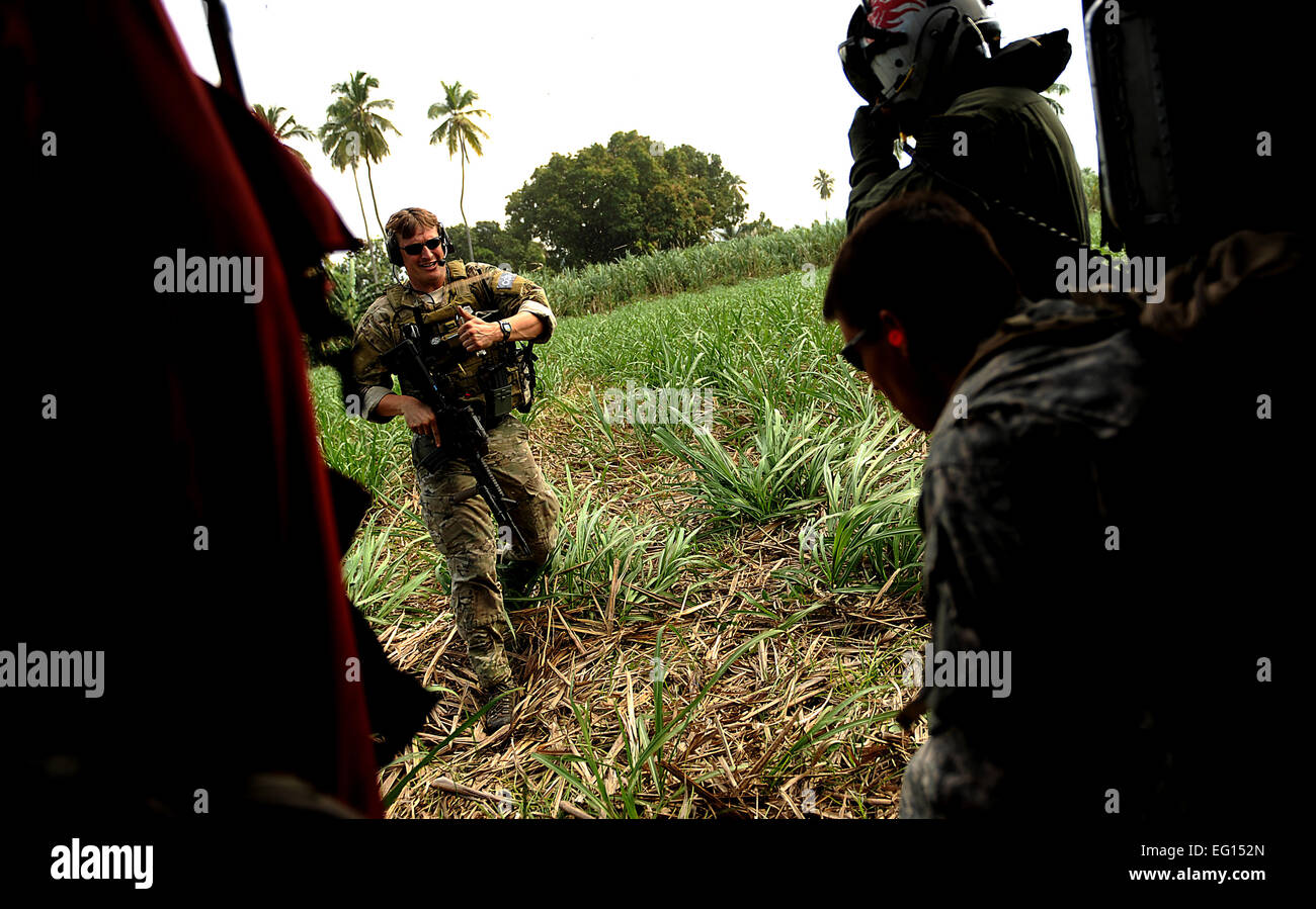 U.S. Air Force Combat Controllers and U.S. Army Pathfinders land in a