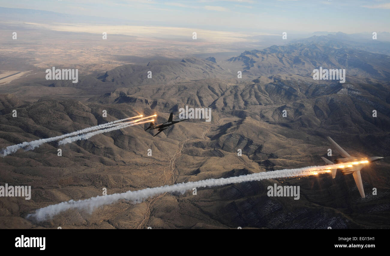A two ship of  B-1B Lancers assigned to the 28th Bomb Squadron, Dyess Air Force Base, Texas, release chaff and flares while maneuvering over New Mexico during a training mission on Feb. 24, 2010.  Dyess will celebrate the 25th anniversary of the first B-1B bomber arriving at the base with the Dyess Big Country Airfest and Open House on May 1, 2010.  Master Sgt. Kevin J. Gruenwald Stock Photo