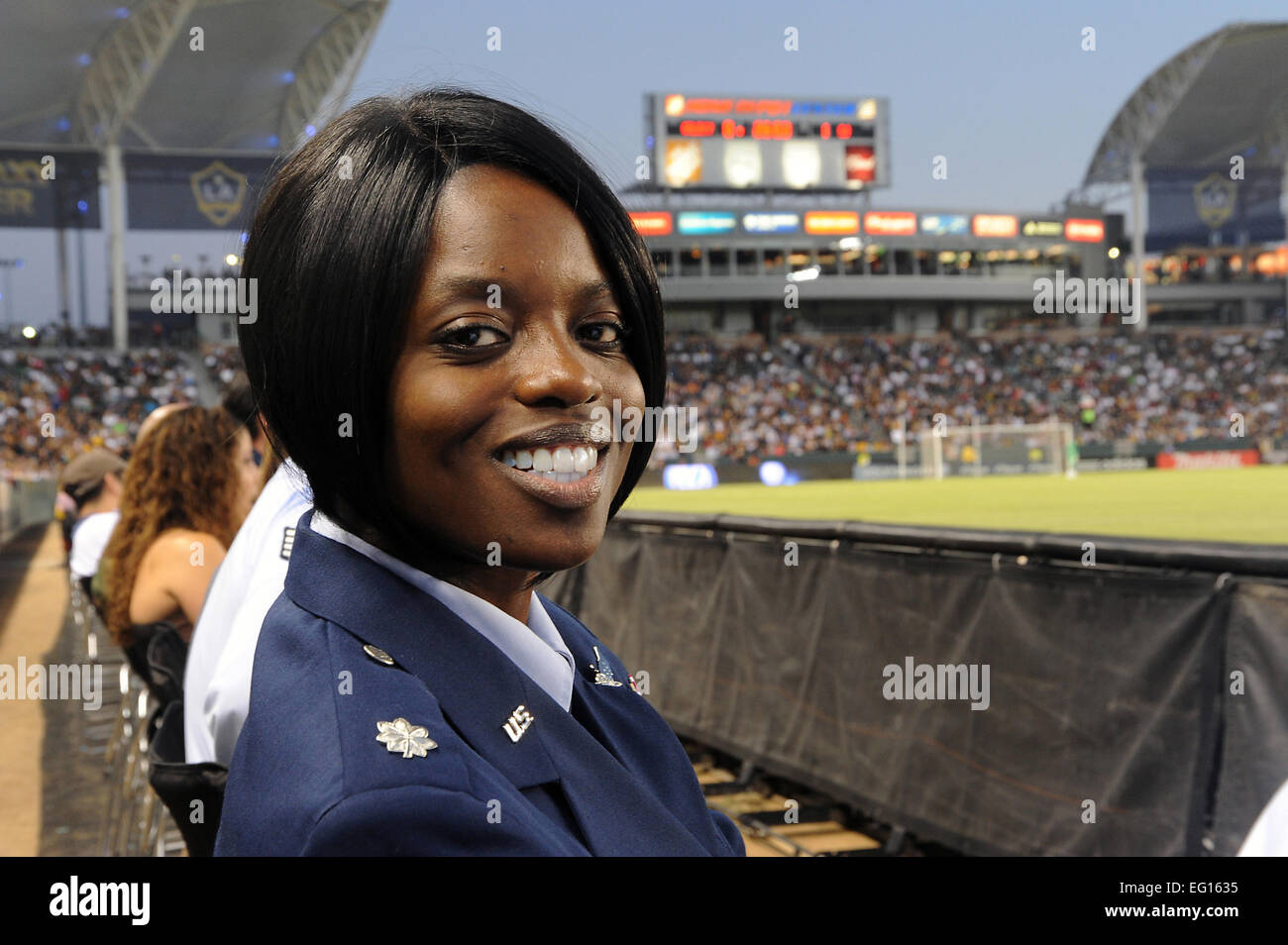 Lt. Col Angernette Coy-Coates, commander 369th Recruiting Command Squadron, enjoys the game after officiating the oath of enlistment to the new recruits.  The 369th Recruiter Squadron gathered approximately 180 Air Force Delayed Enlistment DEPPERS troops from Los Angeles, San Jose, Kern, and Orange counties where they were treated to a professional Los Angeles Galaxy Soccer game, after taking the oath of enlistment at the Home Depot Sports Center, July 22, 2010. Joe Juarez Stock Photo