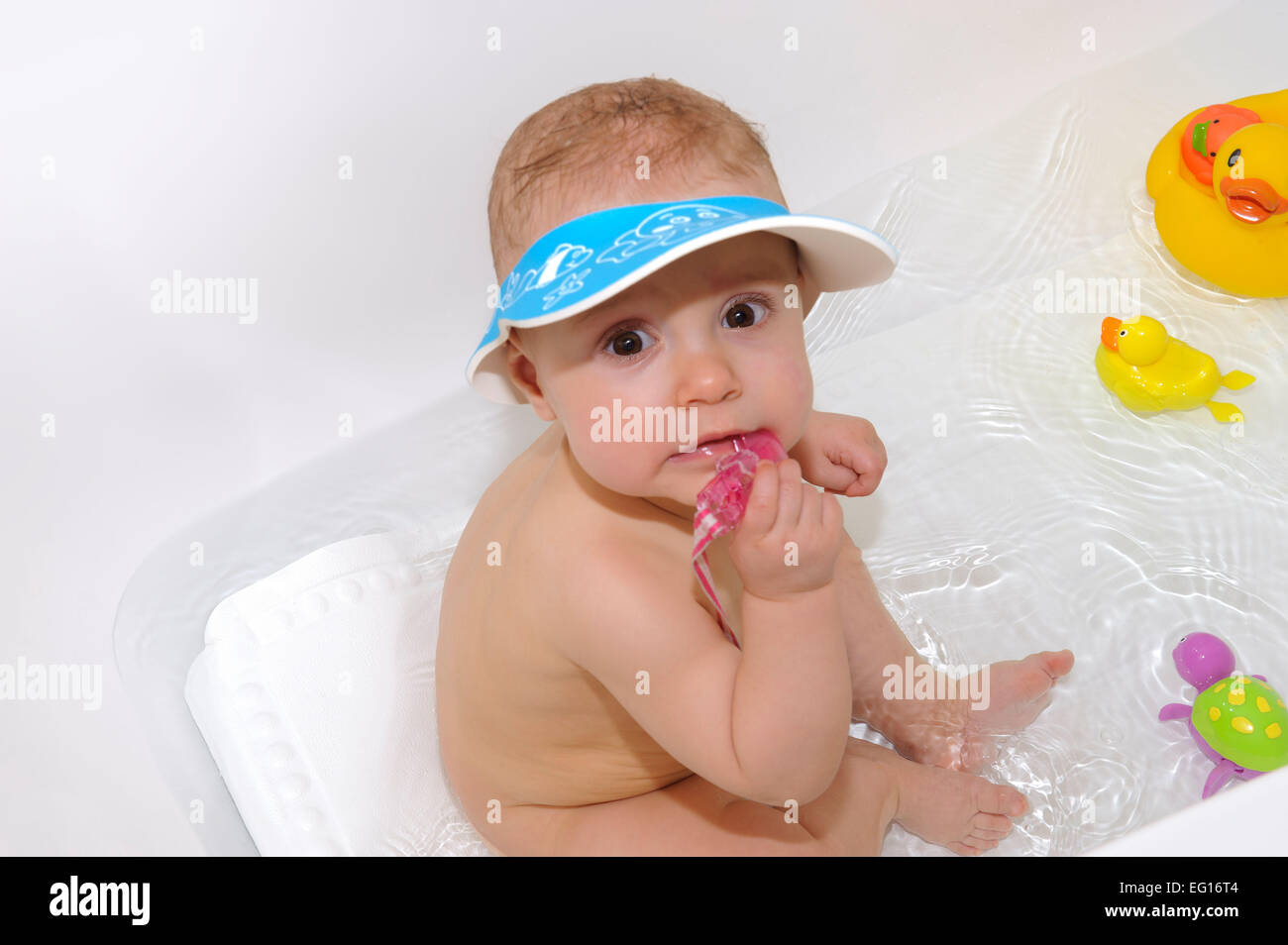 Baby girl at bath time Stock Photo