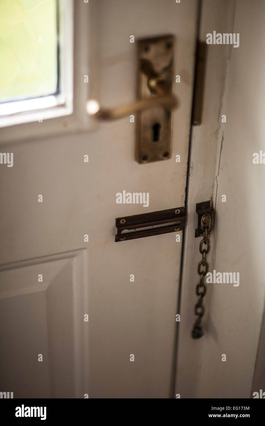 An unlocked front house door. Stock Photo