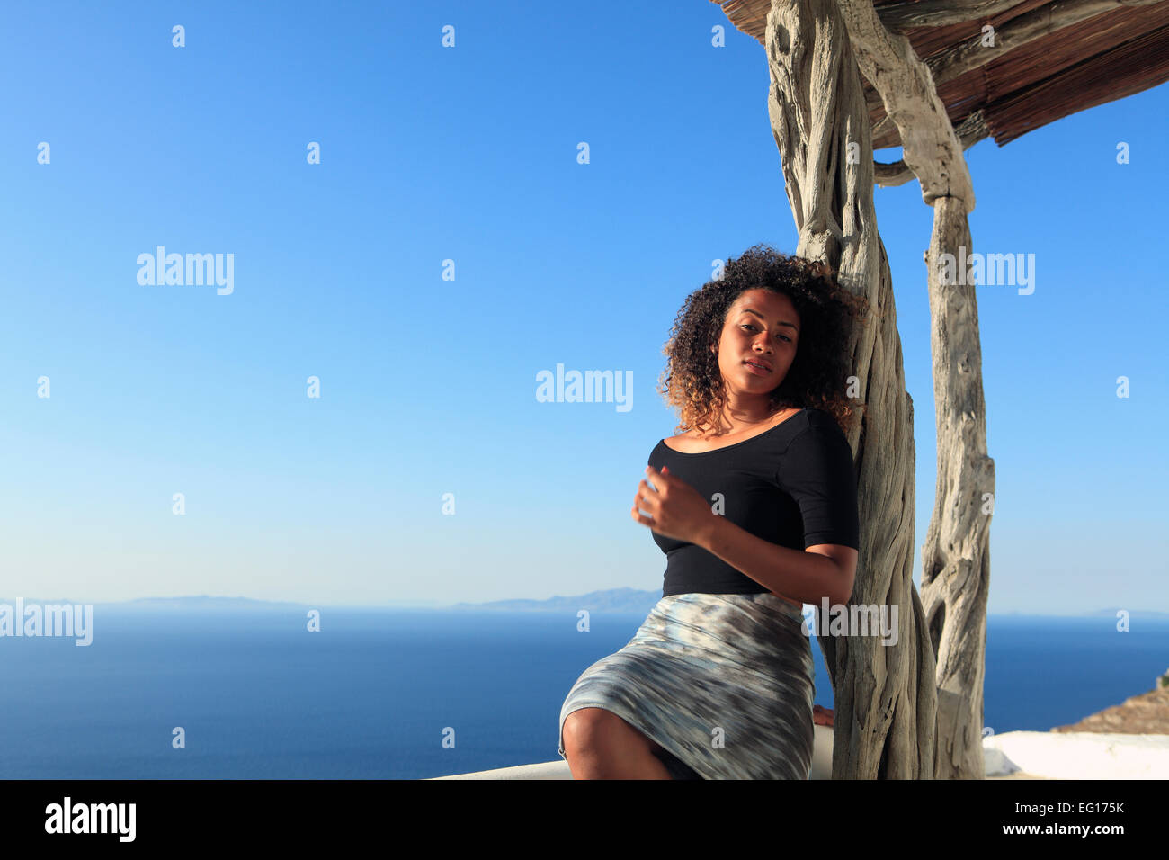 greece a young mixed race girl posing on holiday Stock Photo