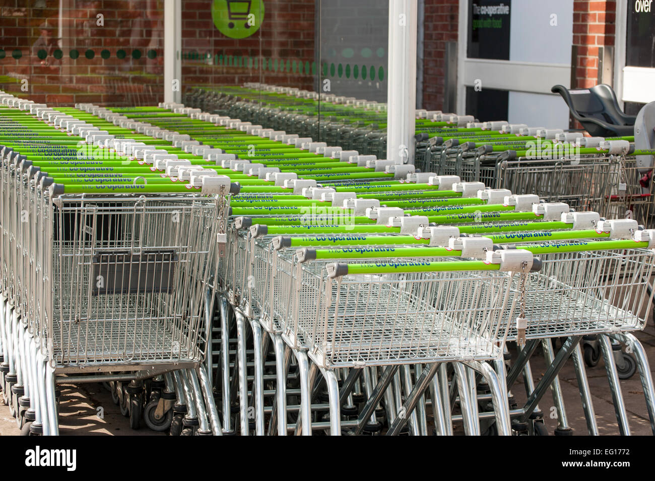 rows of co-op shopping trolleys Stock Photo