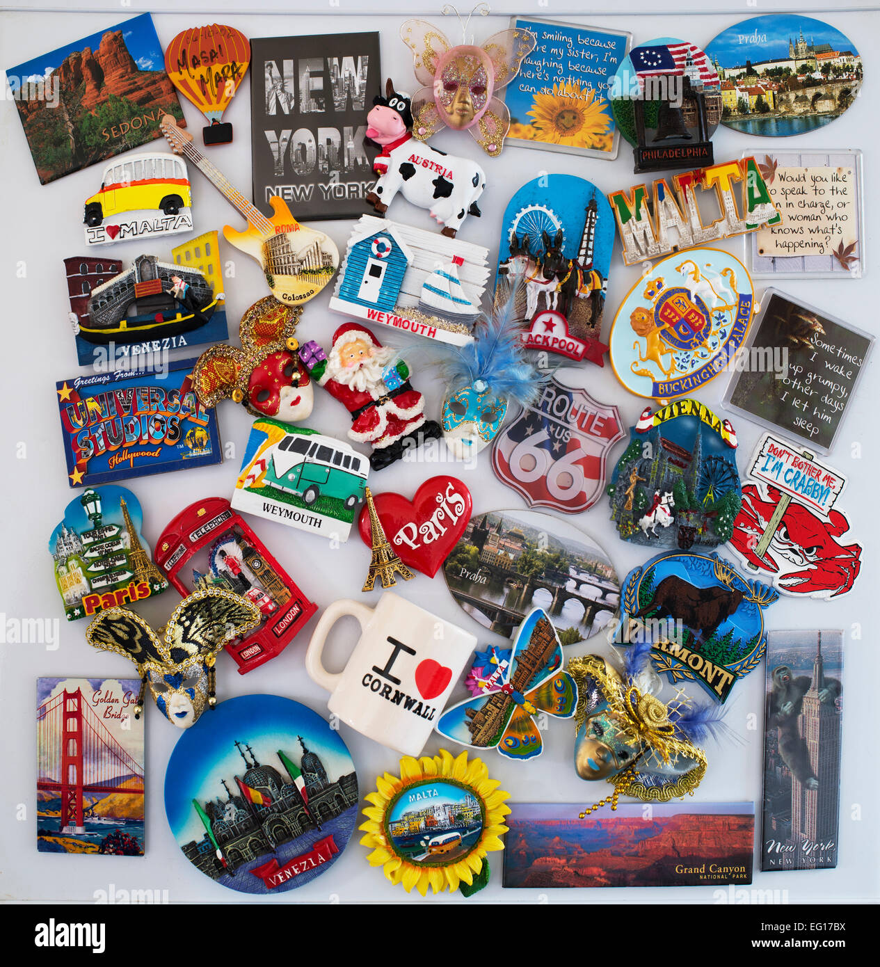 Assortment of travel and quirky fridge magnets on a fridge door Stock Photo  - Alamy