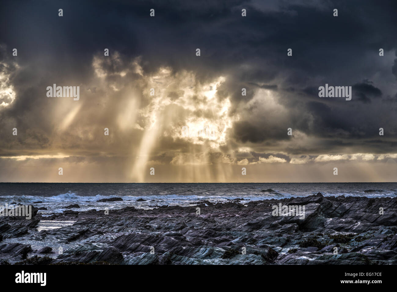 Stormy skies over the sea at Seaton, Cornwall, uk Stock Photo - Alamy