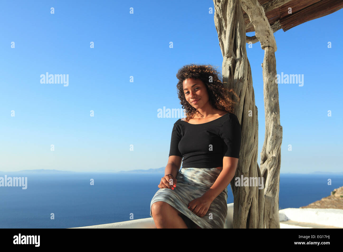 greece a young mixed race girl posing on holiday Stock Photo