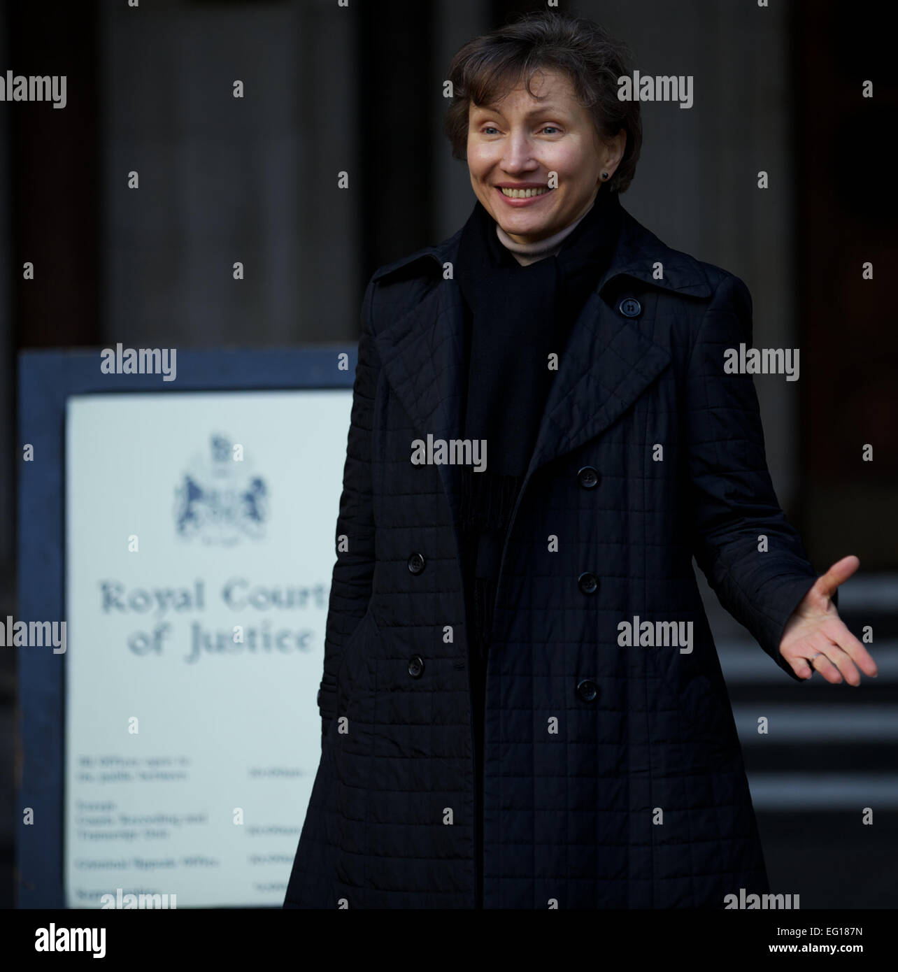 UNITED KINGDOM, London : Russian widow of the former KGB spy Alexander Litvinenko, Marina (R) is photographed leaving Royal Courts of Justice after winning the support of a high court judge to have a public enquiry for the death of her husband in central London on February 11, 2014 Stock Photo