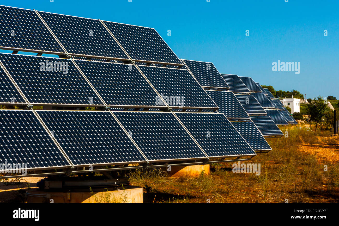 Solar panels in the landscape of the trulli of Alberobello. Green energy concept Stock Photo