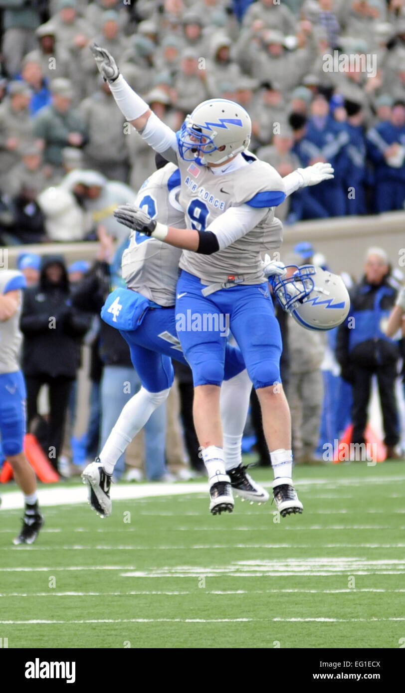 Air Force Academy Falcons linebacker Alex Means celebrates a big stop ...