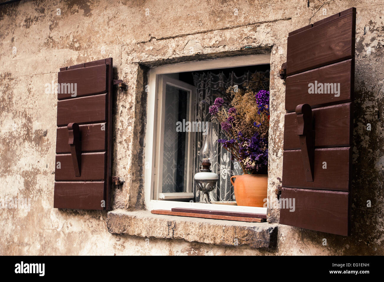 Flowers on a window Stock Photo - Alamy