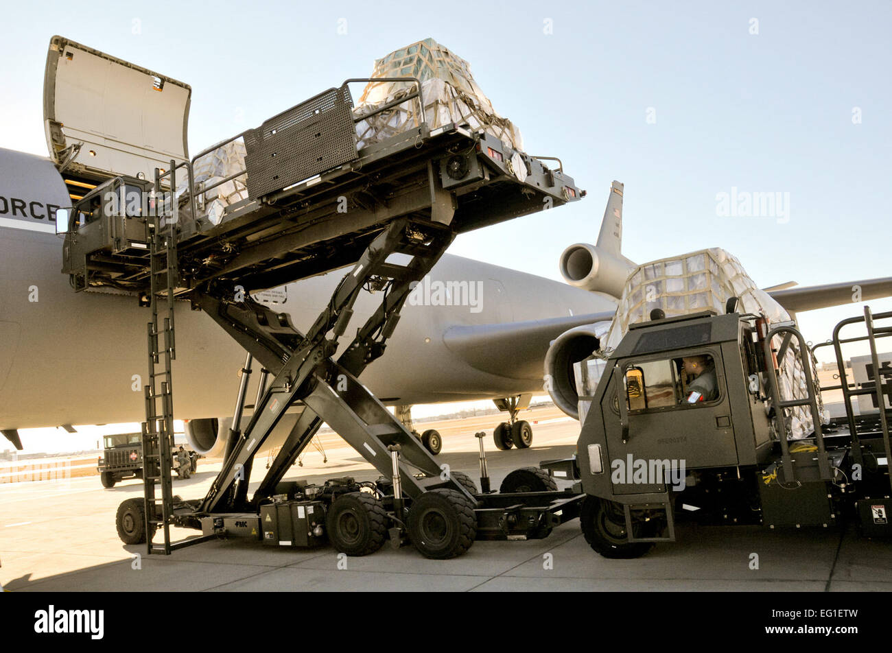 Pallets of supplies from a relief organization are loaded onto a U.S. Air Force KC-135 Stratotanker aerial refueling aircraft Jan. 9, 2012, at the Minneapolis Air Reserve Station in Minnesota. The relief organization, the Denton Program, allows donors to put humanitarian supplies aboard U.S. military transport on a space-available basis.  Shannon McKay Stock Photo