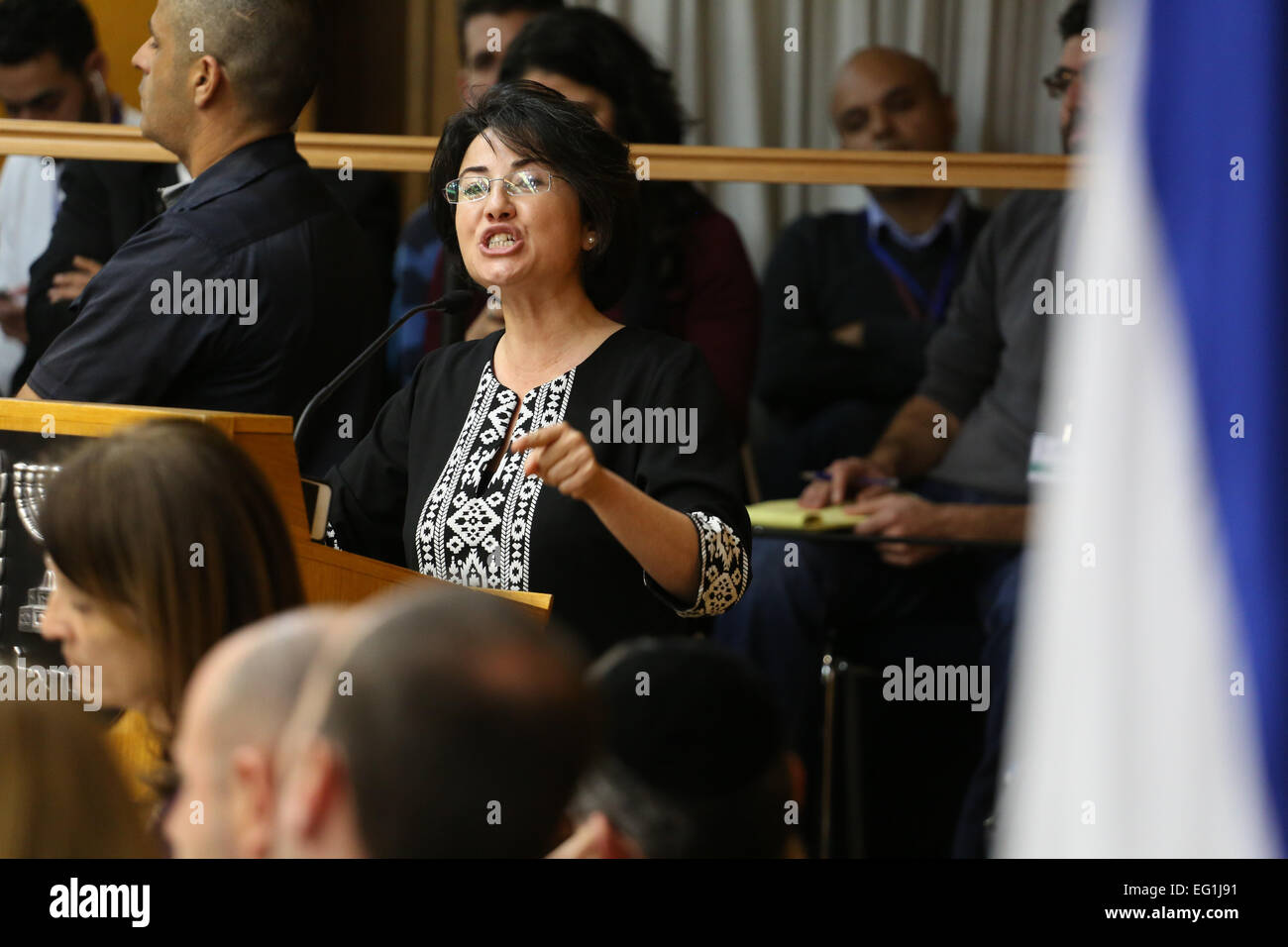 Jerusalem. 12th Feb, 2015. Arab Israeli lawmaker Hanin Zoabi speaks during a vote to disqualify her from running for Knesset elections at the Israeli Central Elections Committee in the Israeli Knesset (parliament) in Jerusalem, on Feb. 12, 2015. The Israeli Central Elections Committee decided on Thursday to ban an Arab lawmaker and a far right-wing activist from running in the upcoming elections due to their controversial public remarks. © JINI/Xinhua/Alamy Live News Stock Photo