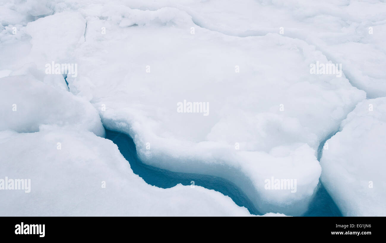 Crack in ice on sea ice in Alaska in winter Stock Photo Alamy