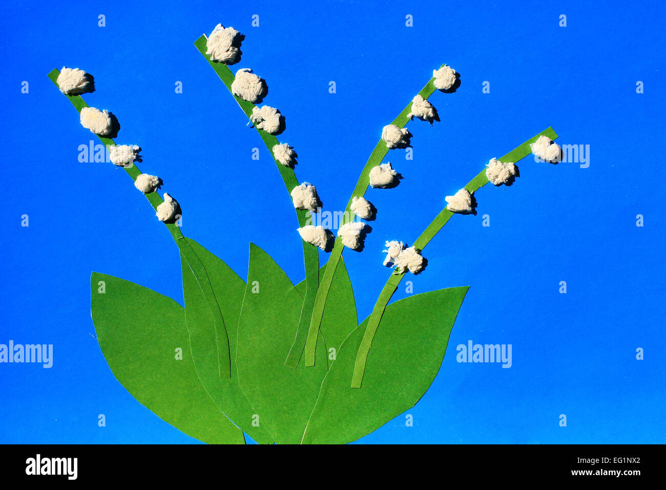 children's odd with tender flowers of lilies of the valley on the light