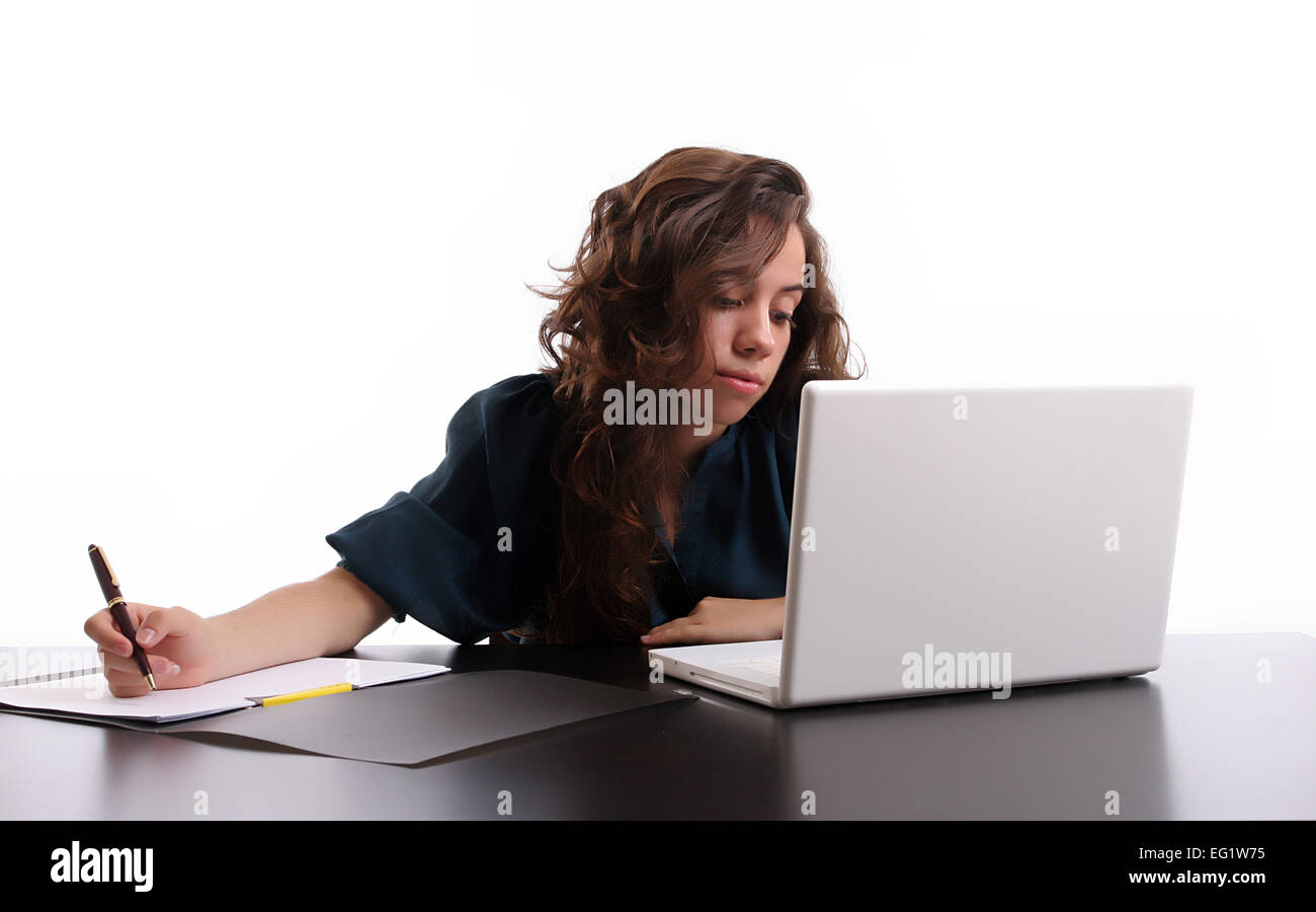 Young beautiful Girl working with laptop, isolated over white Stock ...