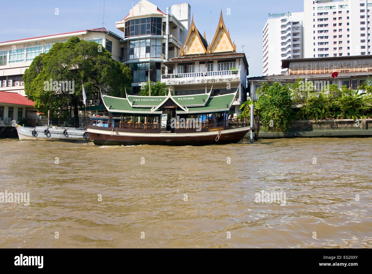 Ferry from the Peninsula Hotel on the Chao Praya River, Bangkok, Thailand Stock Photo