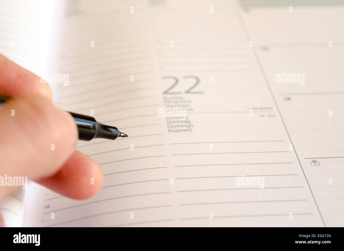 White notepad and ink pen Stock Photo - Alamy