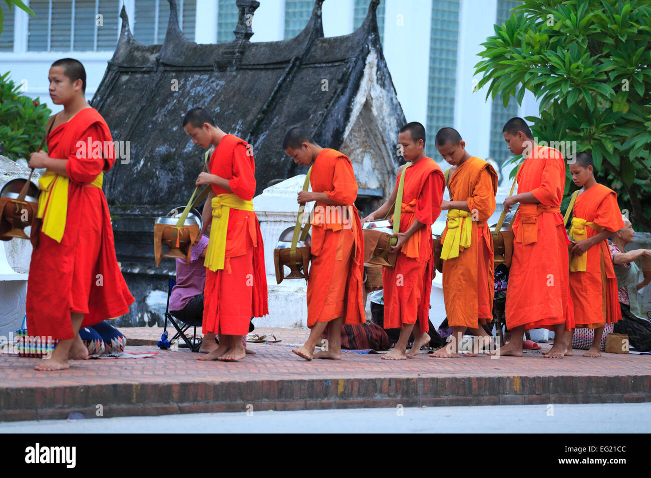 Buddhist monks procession, Buddhist temple, Luang Prabang, Laos Stock Photo
