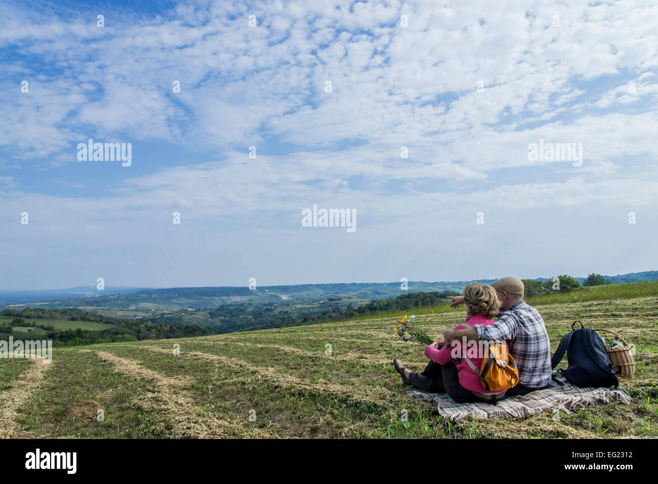 Old couple hill sitting hi-res stock photography and images - Alamy