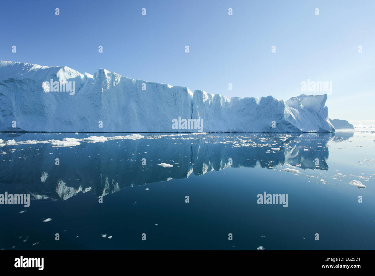 Greenland, Ilulissat Icefjord, tabular iceberg with reflection. Stock Photo