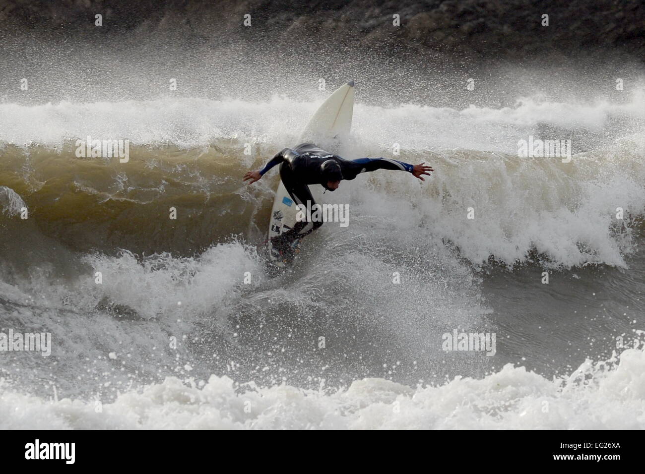 Wave wet wetsuit youth hi-res stock photography and images - Alamy