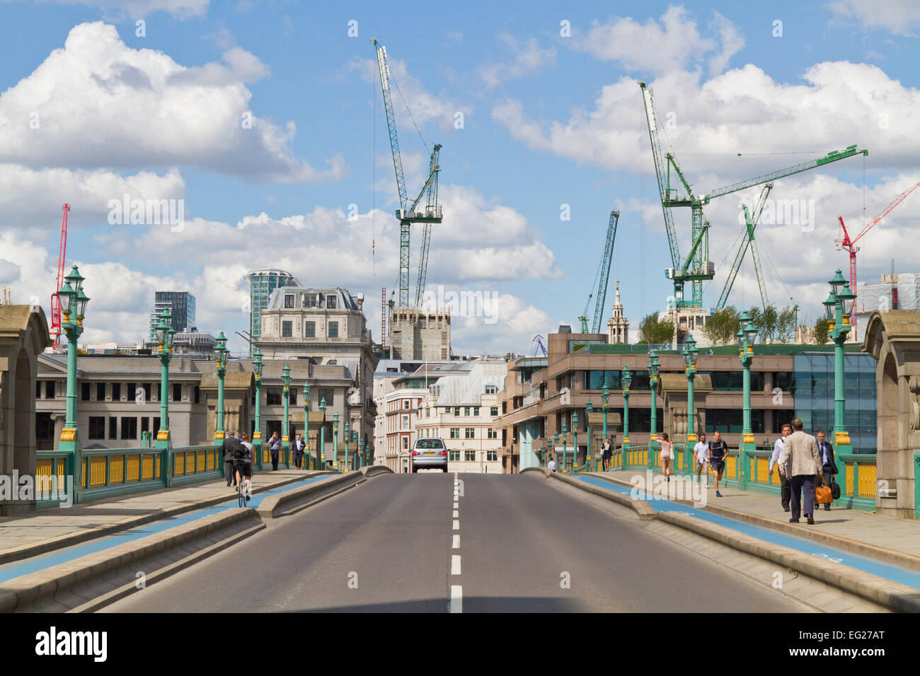 Cranes hanging over a building site in the City of London, seen from