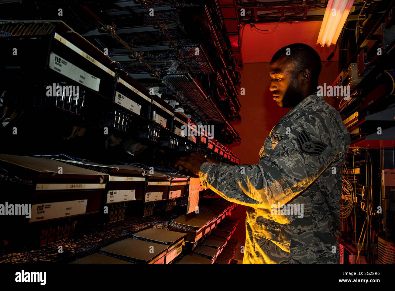Staff Sgt. Spenser Amos finds a new number location on a line equipment