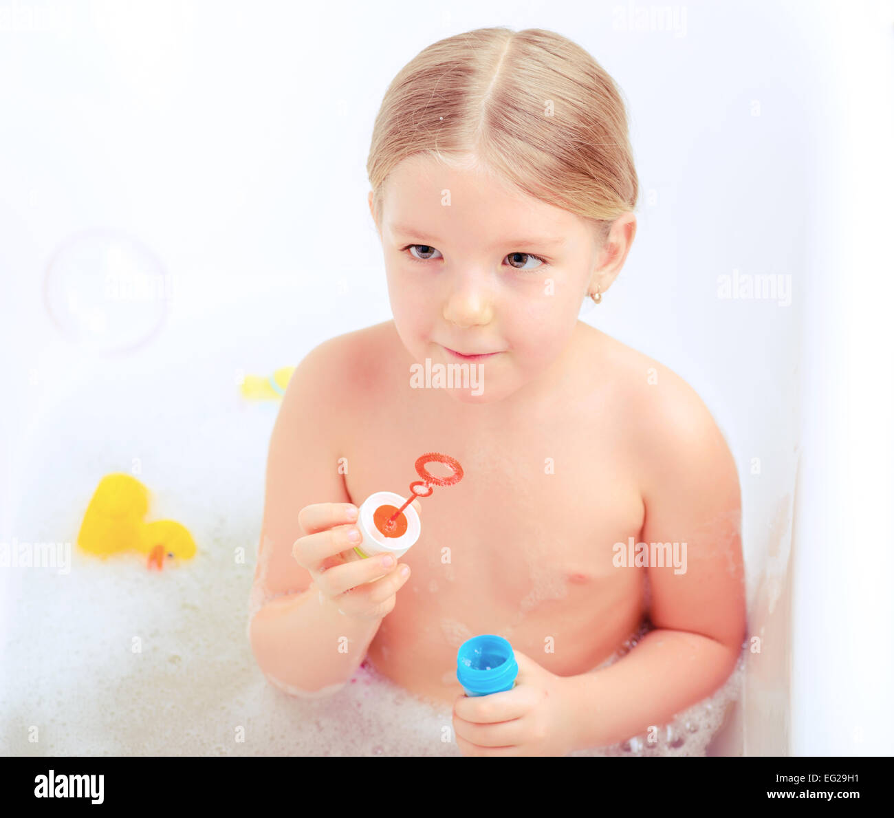 Cute little girl in the bathroom Stock Photo - Alamy