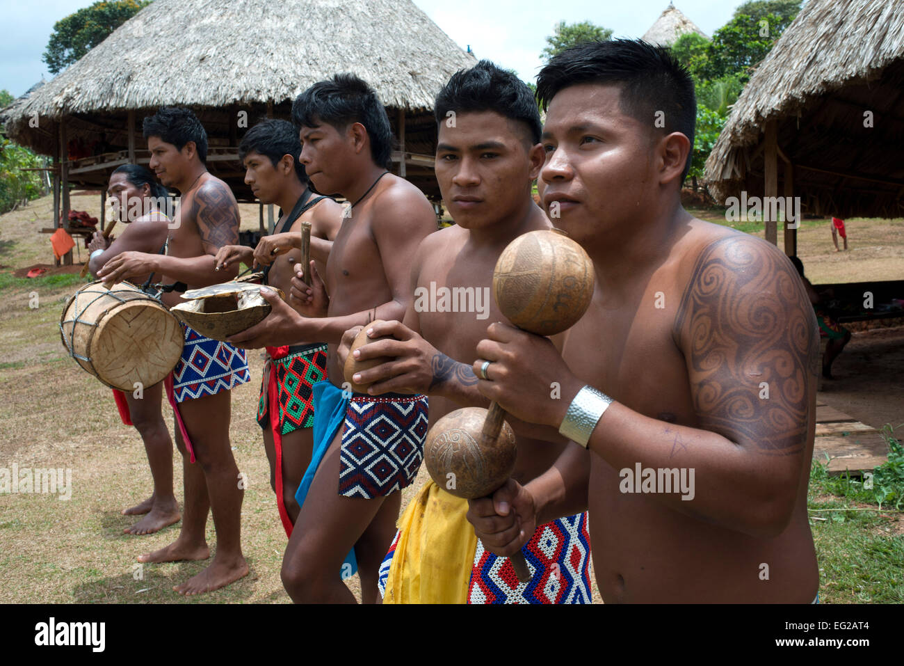 Music and dancing in the village of the Native Indian Embera Tribe, Embera Village, Panama. Panama Embera people Indian Village Stock Photo