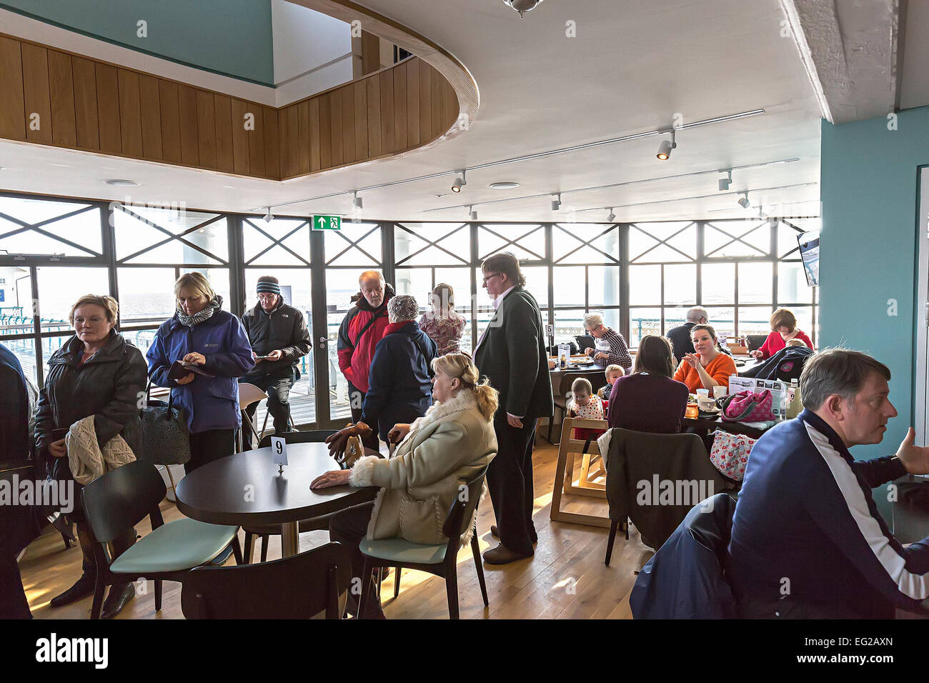 People in cafe on the Victorian pier at Penarth, Wales, UK Stock Photo