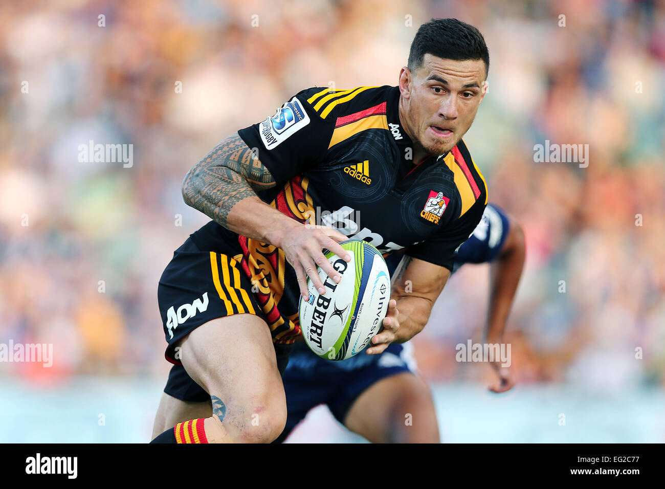 Auckland, New Zealand. 14th Feb, 2015. Sonny Bill Williams of the Chiefs makes a break. Super Rugby match, Blues (Auckland) versus Chiefs (Hamilton) at QBE Stadium, Auckland, New Zealand. Saturday 14 February 2015. The Chiefs ran out winners by 18-23 in a close derby. © Action Plus Sports/Alamy Live News Stock Photo