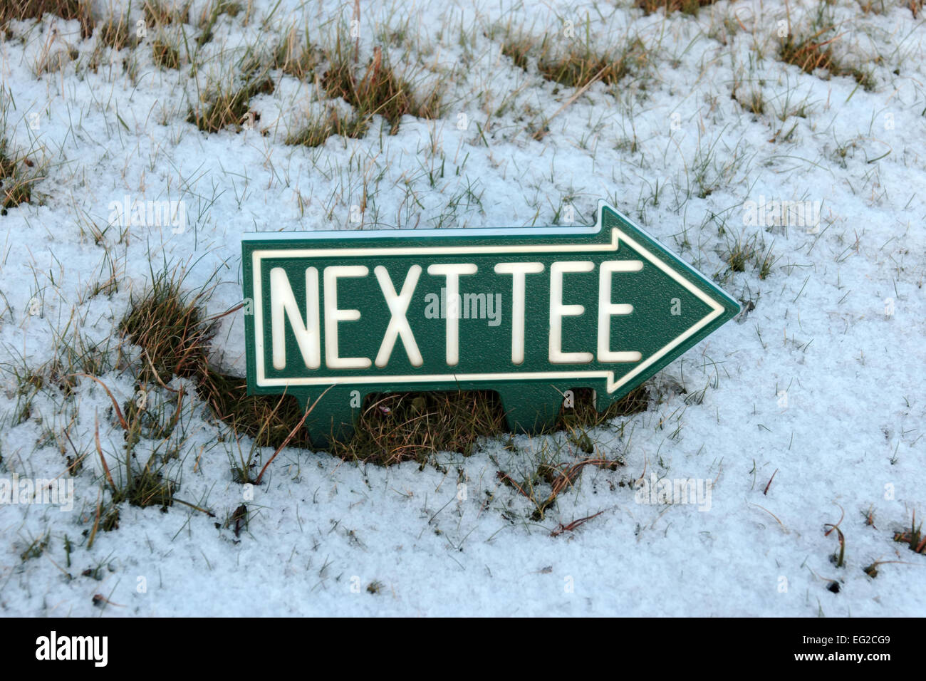 the next tee sign on an irish golf course in the winters snow Stock Photo