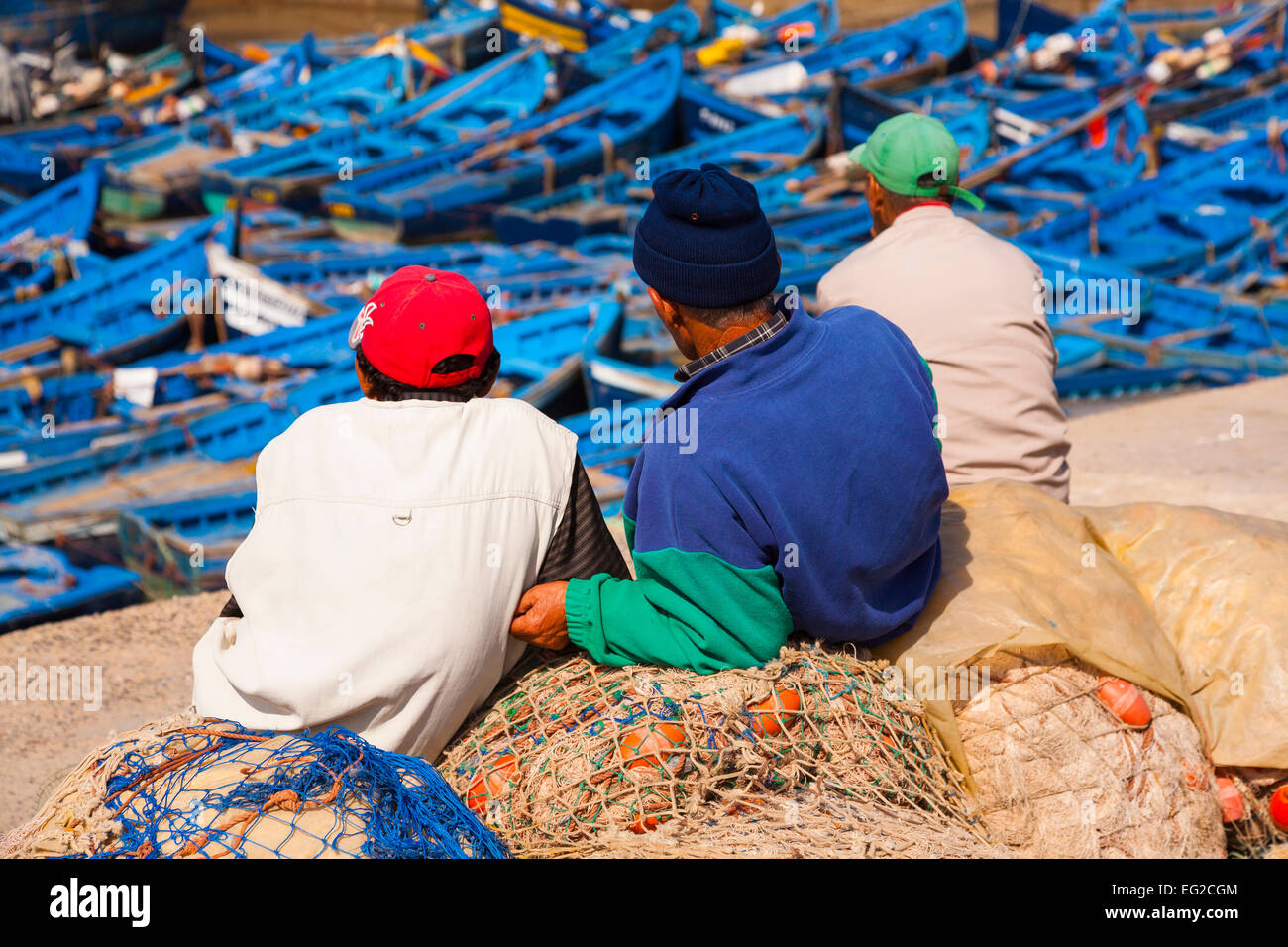 Fishermen resting at the port of Essaouira, Morocco Stock Photo
