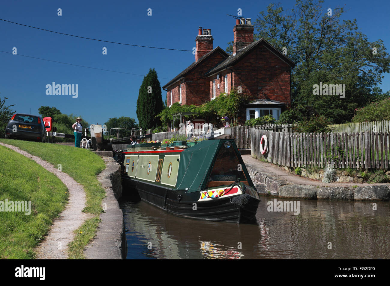 A narrowboat emerging from Shardlow Lock No. 2 on the Trent and Mersey ...
