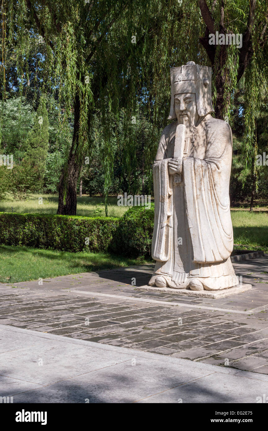 Carved statues on the tree-lined avenue, the Sacred Way of the Ming Tombs, Changling, Beijing, China. UNESCO World Stock Photo