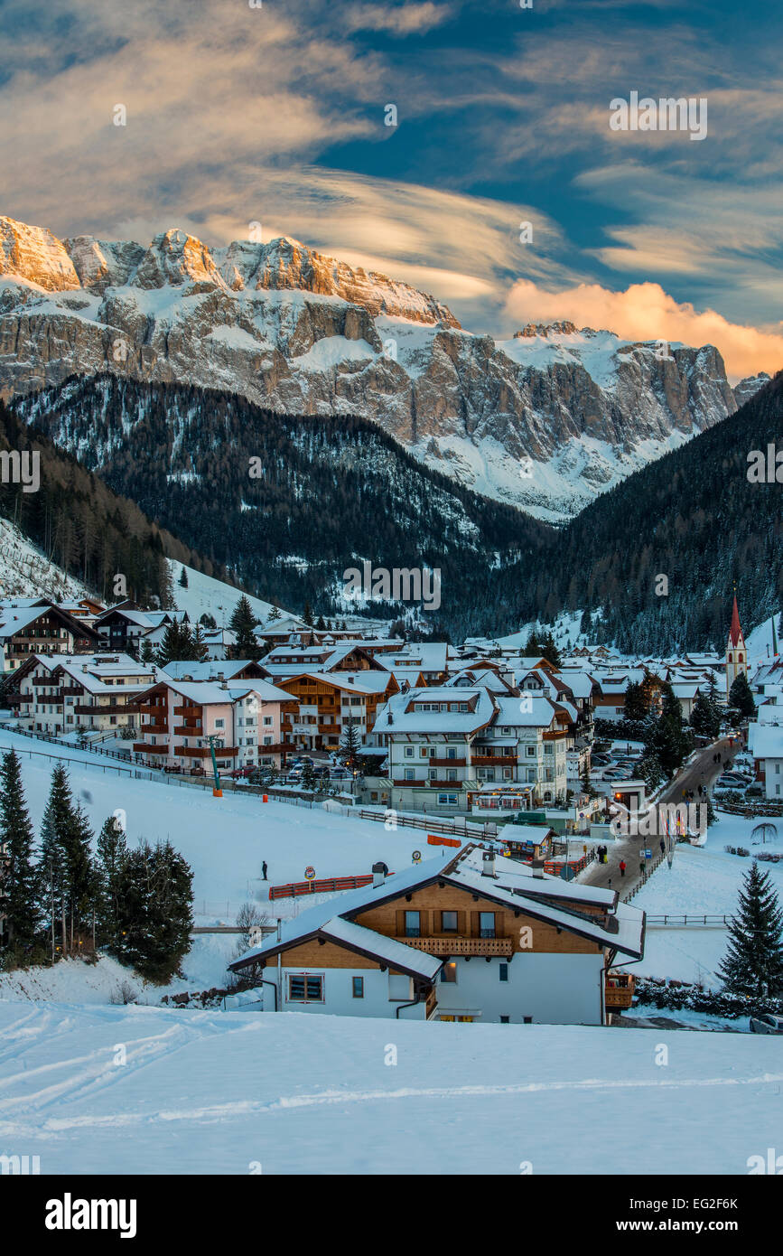Winter view at sunset of Selva di Val Gardena with Sella massif in the background, Dolomites, Alto Adige - South Tyrol, Italy Stock Photo