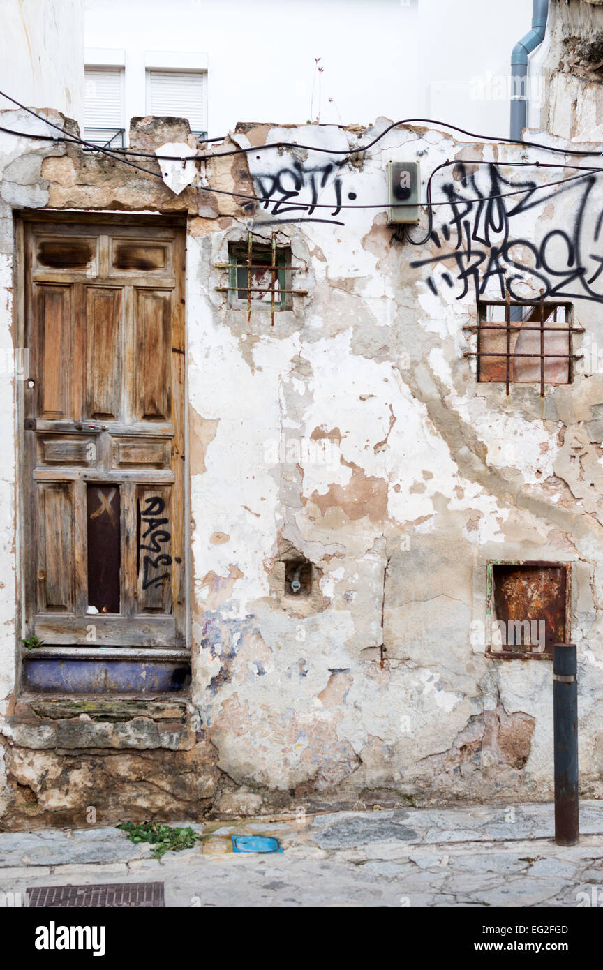 Old, derelict house-front in a rundown back street in Palma de Mallorca, Balearic Islands, Spain Stock Photo