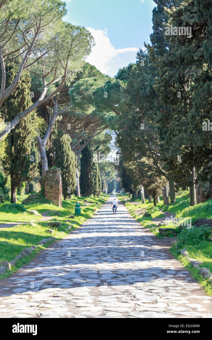 View down the ancient Via Appia Antica in Rome, Italy. Stock Photo