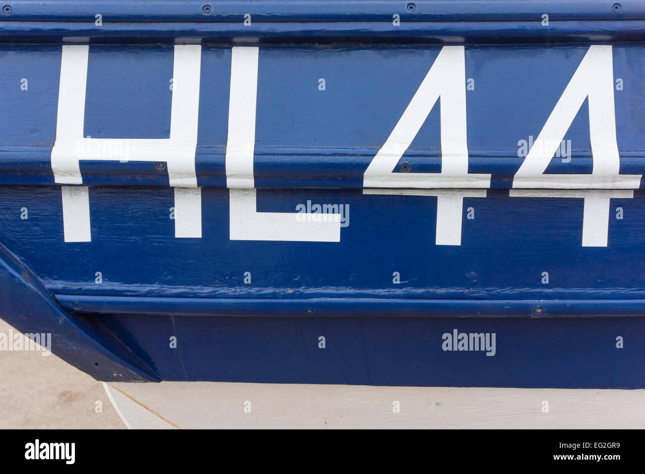 Fishing boats are registered with letters indicating original port of