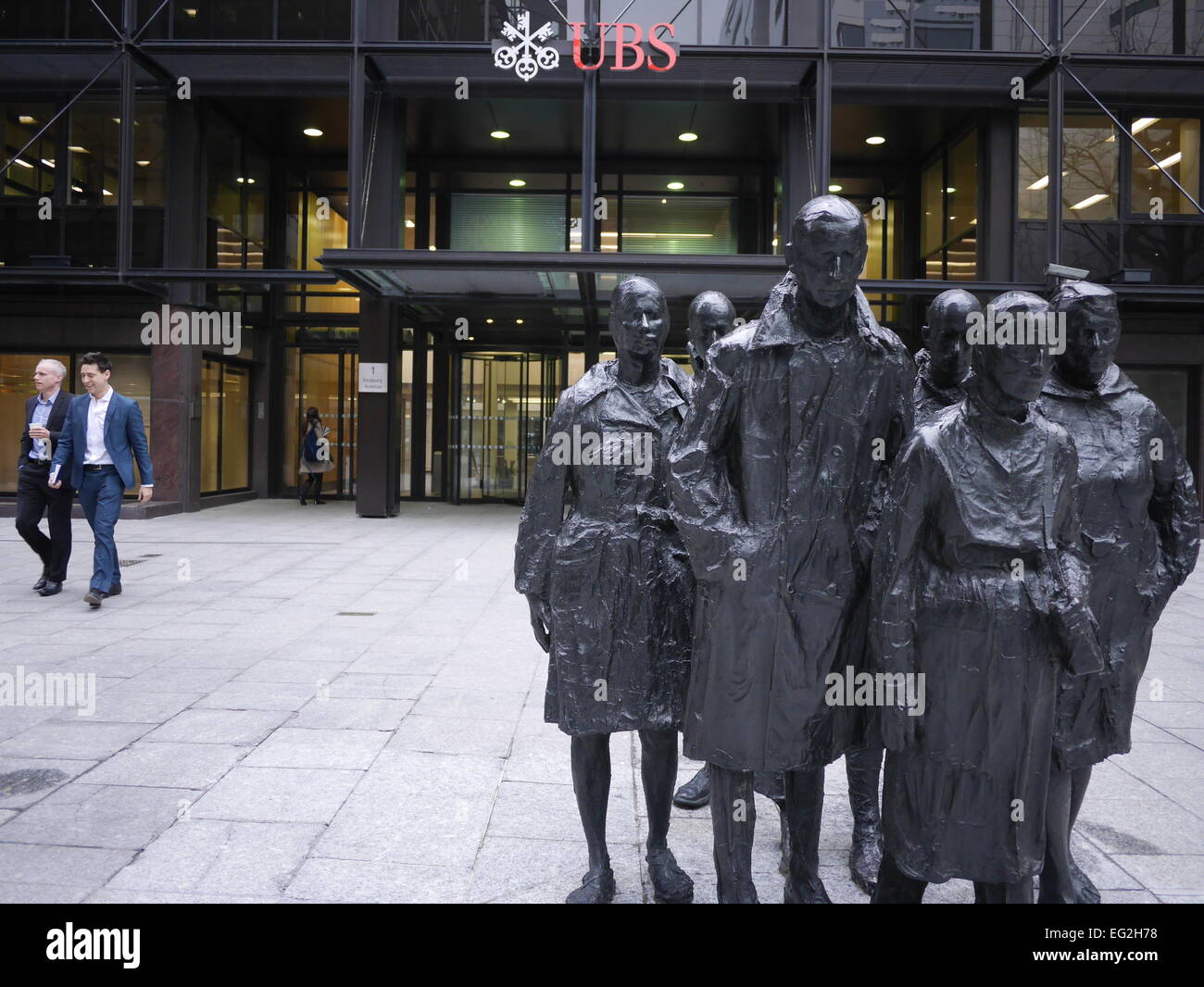 UBS headquarters building in  Broadgate London with statue Rush Hour by George Segal Stock Photo